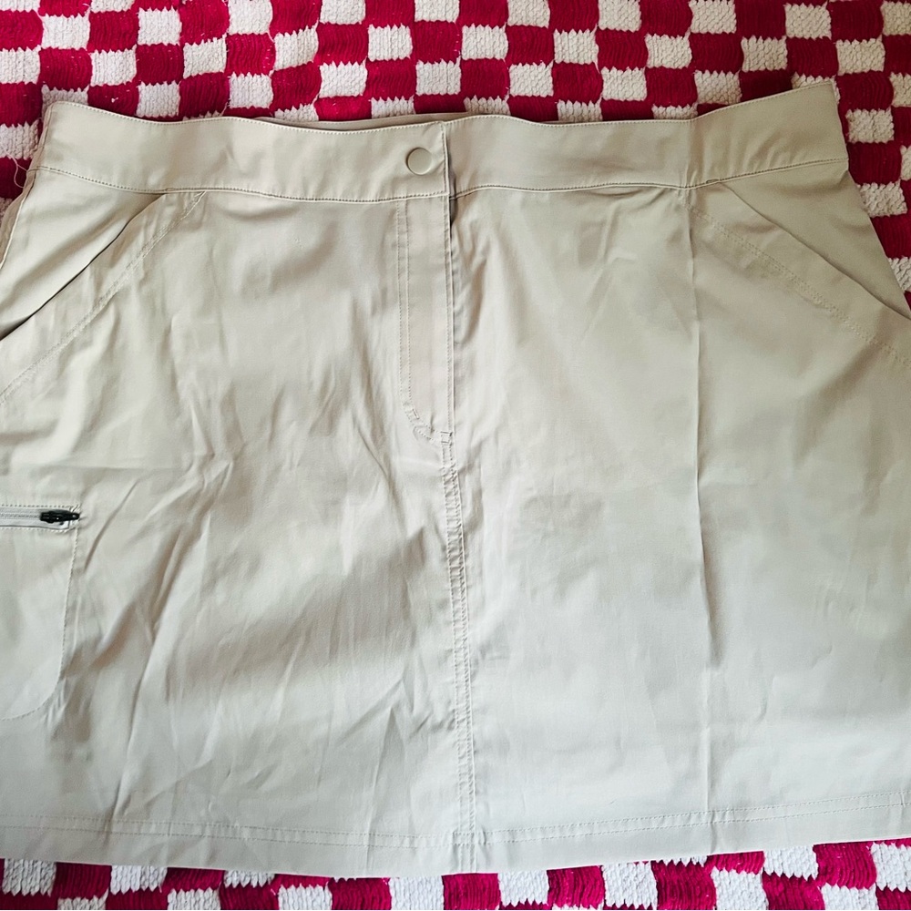 Tan skirt with shorts inside. Super lightweight and comfortable.